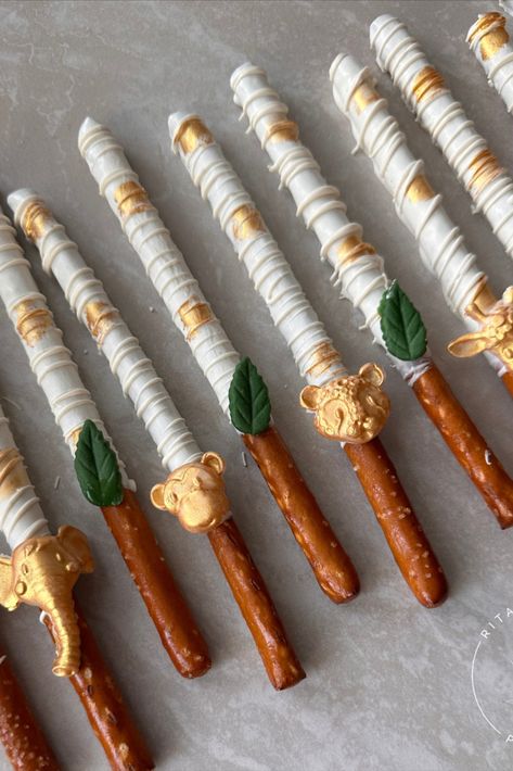 12 Safari Chocolate Dipped Pretzel Rods, Safari Baby Shower, Wild One Birthday, Baby Shower Favors, Dessert Table, Safari Party Treats Jungle Theme Cupcakes, Birthday Desert, Safari Baby Shower Cake, Chocolate Dipped Pretzel Rods, Safari Baby Shower Boy, Dipped Pretzel Rods, Lion Baby Shower, Baby Shower Fruit, Jungle Safari Baby Shower