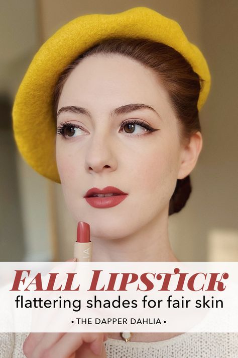 Woman with red hair and fair skin wearing a yellow beret and holding a tube of lipstick by Ilia. Fall Lip Colors For Fair Skin, Fall Lipsticks For Fair Skin, Fall Makeup For Fair Skin, Brown Lipstick For Fair Skin, Best Bridal Lipstick, Fall Lipstick Colors 2024, Soft Autumn Red Lipstick, Lip Shades For Fair Skin, Redhead Lipstick Shades