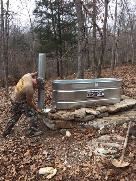 Our rocket stove hot tub — Steemit Galvanized Stock Tank Hot Tub Ideas, Galvanized Hot Tub, Water Trough Hot Tub Diy, Rocket Stove Hot Tub, Hot Tub Wood Fired, Homemade Hot Tub, Natural Hot Tub, Hillbilly Hot Tub, Rustic Hot Tubs