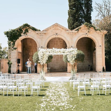 What is a chuppah? It is one of the most important details of a Jewish ceremony - the canopy under which the couple stands throughout the ceremony. It is traditionally joined by both parents and the rabbi conducting the ceremony. The chuppah symbolises the new home that the newlyweds will build together - it is symbolised by the cloth covering and the four poles outlining the structure. We invite our couples to not only honour tradition, but at the same time to express their individuality ... The Cloth, Winery Weddings, The Four, Rome, Wedding Planner, New Home, Dj, Villa, Parenting