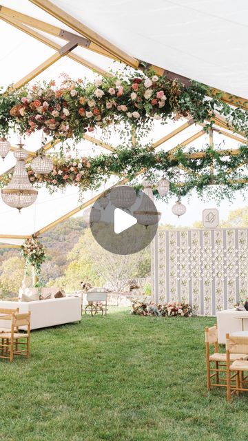 Julia Kentner | Destination Wedding Video on Instagram: "It truly takes a village! Take a peek behind the scenes to see how we made this dreamy cocktail hour and after-party tent come to life ✨   Planning & Design: @jillperezevents Photo: @mikecassimatis Cinema: @juliakentnerfilms Florals: @amfloraldesigns Paper: @chereeberrypaper Tent: @mahaffeytent Venue: @bigcedarlodge Rentals & Decor: @foundrentalco @theark_ Lighting + Decor: @tpistl Cake: @cfcakedesign Linens: @nuagedesignsinc @baslerliz @castledesignstl Entertainment: @partyotm @isaackennethmusic Hair & Makeup: @daniellestyle @thegoldenpalettebeauty Bridal Gown: @lelarosebridal Bridal Party: @jennyyoonyc Tux Rentals: @theblacktux  #tentedwedding #weddingafterparty #chereeberrypaperanddesign #weddingrentals #weddinginspo #weddingdesig Wedding Tent Decorations Ceiling Decor Hanging Flowers, Hanging Florals Wedding Tent, Wedding Tent Hanging Greenery, Tented Wedding Reception With Hanging Flowers, Hanging Floral Installation Wedding Tent, Cocktail Hour Wedding, Wedding After Party, Rental Decorating, Party Tent