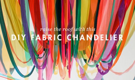 Raise the roof with this DIY fabric chandelier. Chandelier Cover Diy, Fabric Chandelier Diy, Streamer Chandelier Diy, Diy Light Chandelier, Fabric On The Ceiling, Crayon Chandelier, Ribbon Chandelier Diy, Diy Hanging Chandelier, Diy Chandelier Ideas Upcycling