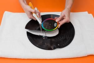 How to Upcycle Your Old Records | HGTV Vinyl Record Roses Diy, 45 Records Decorating With, Vynil Record Crafts, What To Do With Old Vinyl Records, Vinyl Repurpose, Vinyl Record Crafts Diy, Diy Vinyl Record Projects, Repurpose Records, Record Art Ideas