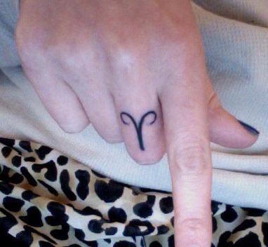 Aries finger tattoo Girl Finger Tattoos, Tattoo Finger, Tattoos For Girls, Aries Tattoo, Tattoo Quotes For Women, Hand Poked Tattoo, Trendy Tattoo, Finger Tattoo, Feather Tattoos