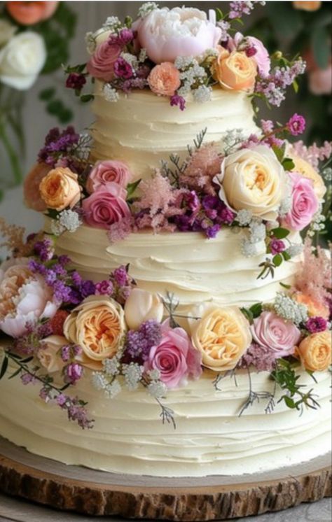 White wedding cake with flowers 🌷 Wildflower Wedding Theme Cake, Pink Flower Wedding Cake, 2 Tier Wedding Cake With Flowers, Wedding Cakes 2024, Wedding Cake With Colorful Flowers, Flower Themed Cake, Spring Wedding Cake Ideas, Wedding Cake Colorful, Wedding Cake With Real Flowers