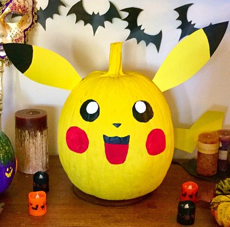 Pikachu Pumpkin Painted the whole pumpkin with Bright Yellow acrylic paint, black and white for eyes, red for cheeks, red, black and brown(mixed black and red) for mouth. Used yellow cardboard for ears and tail. Have fun!!! Yellow Pumpkin Decorating Ideas, Superhero Pumpkins Decorating, Pikachu Pumpkin Painting, Pumkin Characters, Pumpkin Painting Ideas Picachu, Pumpkin Carving Pikachu, Bulbasaur Pumpkin Painting, Pumpkin Pikachu, Yellow Pumpkin Carving