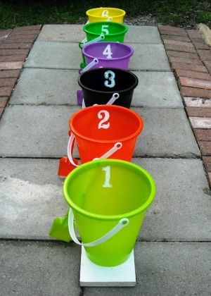 Reminds me of the Bozo Show's Grand Prize game. Each bucket denotes a certain prize - #1 equals a small simple prize. #6 equals a more substantial prize. Fall Festival Games, Fest Ideas, Fun Halloween Party Games, Fall Carnival, Fun Halloween Games, Festival Games, Halloween Games For Kids, Carnival Theme, Fall Fest