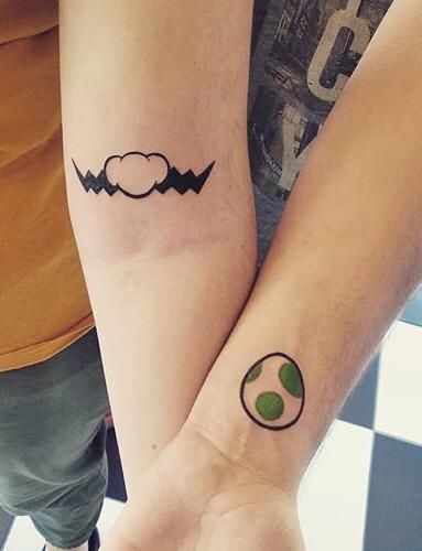 Yoshi Egg Tattoo, Yoshi Tattoo Design, Yoshi Tattoo, Mustache Tattoo, Yoshi Egg, Nintendo Tattoo, Cute Tattoos On Wrist, Gamer Tattoos, Trending Tattoos