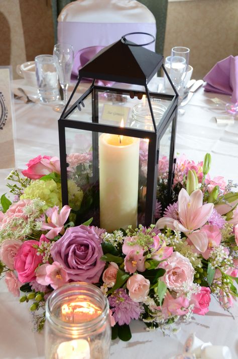 Candle Centerpiece! #wedding #centerpiece #candlecenterpiece #candle #weddingflowers @Stellas Florist Candle Centerpiece Wedding, Centerpieces With Flowers, Lantern Flowers, Wedding Table Deco, Wedding Lantern, Candle Centerpiece, Lantern Centerpieces, Wedding Lanterns, Centerpiece Wedding