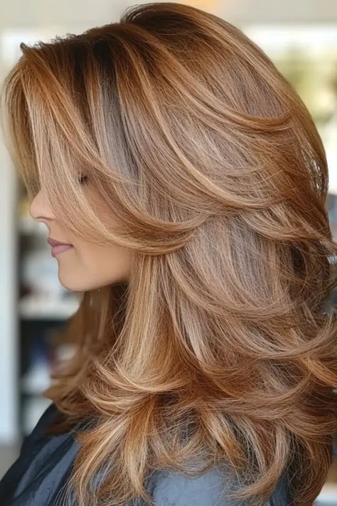 Woman with layered, voluminous, golden-brown hair looking to the side. Hair Color Honey, Bold Highlights, Brunette Tones, Balayage Hairstyle, Golden Brown Hair Color, Natural Brown Hair, Balayage Ideas, Rambut Brunette, Honey Hair Color