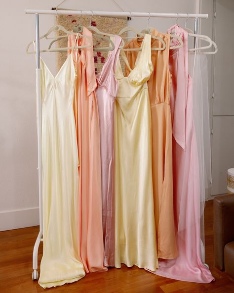 A pastel dream of @amandawishi wedding in sunny California! Capturing the beauty of these delicate, flowing pieces all together - the soft pinks, peaches, and sunny yellows create such a dreamy, romantic vibe. When you can’t decide which one you love most, dress your bridesmaids in all. Because times of all matched same bridal party are so done, hey ! #bridesmaids #bridalparty #bridesmaidsdresses Pastel Pink Bridesmaid Dresses, Pastel Bridesmaids, Peach Bridesmaid Dresses, Pastel Bridesmaid Dresses, So Done, Yellow Bridesmaid Dresses, Yellow Bridesmaids, Pink Bridesmaid Dresses, Sunny California