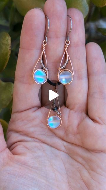 16K views · 1.8K likes | OxanaCrafts on Instagram: "✨This earrings and pendant set is really fun to make and perfect as a beginner wire wrapping project. It uses only one type of wire: 20 gauge round dead soft wire
The full tutorial can be found on my YouTube channel OxanaCrafts, it is from May 2023.
These beautiful beads are a man made "moonstone" and I love the way they glow! 

#wirewrapping
#wirejewelry #wirewraptutorial #diyearrings #diycrafts #diyjewelry #youtuber #tutorial #jewelrytutorial #jewelrydiy" Wire Wrapped Jewelry Beginner, Beginner Wire Wrapping, Twisted Jewelry, Twist Jewelry, Wire Wrapping Tutorial, Wire Work Jewelry, Work Jewelry, Wire Wrapped Earrings, May 2023