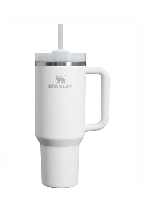 This Stanley Quencher H2.0 FlowState 40oz Travel Tumbler in Frost is just what you need for all-day hydration. Take it with you to a high-intensity workout or on an extra-long commute to keep your drink cold for hours. The lid features a rotating cover with three positions: a straw opening, a wide mouth for drinking, and a full-cover top to prevent spills. Features: Stanley Style: 10-10824-279 FROST Color: Frost 90% Recycled 18/8 stainless steel, BPA-free Recycled stainless steel icon inside the tumbler indicates your Quencher is made from sustainable material Double-wall vacuum insulation Powder coat finish FlowState™ screw-on 3-position lid Reusable straw Comfort-grip handle Car cup holder compatible (base diameter: 3.1 inches) Dishwasher safe Dimensions: 3.86 L x 5.28 W x 12.3 H White Stanley Cup, White Stanley, Miss The Old You, Stanley Water Bottle, Stanley Products, Stanley Cups, Cute Water Bottles, Hello Kitty Halloween, Stanley Quencher