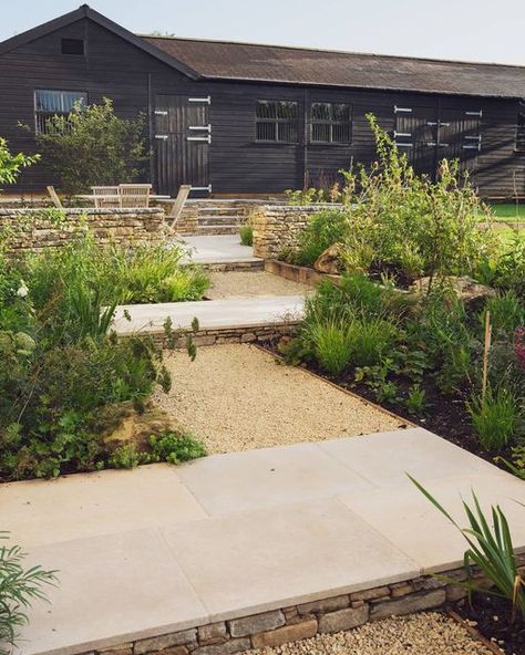 Artisan Landscapes ® on Instagram: "The stepped walkway leading up to the new terrace and old stables. Purbeck walling, limestone paving and Cotswold gravel combine to create a gentle level change, softened by the bordering plants." Limestone Gravel, Front Door Landscaping, Old Stables, Limestone Paving, Gravel Landscaping, Paving Ideas, Garden 2023, Landscaping Retaining Walls, Zen Home