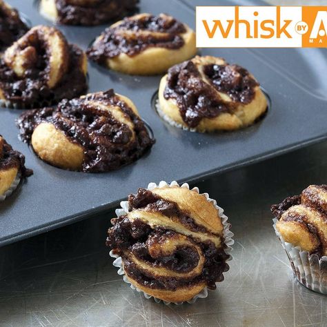 Adorable bite-size versions of the classic Jewish yeast cake. Makes 46- 48 bites Jewish Desserts, Jewish Holiday Recipes, Babka Recipe, Chocolate Babka, Soup Kitchen, Mini Muffin Pan, Sukkot, Emergency Food, Jewish Recipes