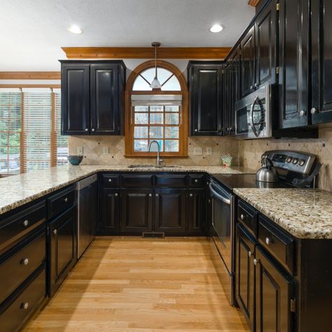 Mood -- are you feeling it? 🖤 Do you enjoy the contrast the black gives to the earthy elements? #blackkitchen #design #kitchendesign #kitcheninspo #interiordesign #remodel #home #renovation #rustic #modern #soulful #chic #texture #designinspiration #inspotoyourhome #inspo #makehomeyours #kitchenisland #makehomeyourhaven #makehomematter #kitchengoals #dreamkitchen #naturalstone #designmyspace #storyofmyhome #fearlessinteriors #glowupmypad #myrevampreveal #kitchenlove Black Kitchen Cabinets With Brown Granite, Kitchen Cabinets With Brown Granite, Cabinets With Brown Granite, Black Cabinets Kitchen, Exterior Kitchen Doors, Modern Kitchen Cabinet Design Ideas, Brown Granite Countertops, Countertop Choices, Kitchen Brown