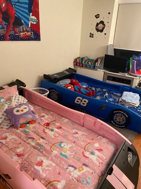 Brother and sister shared room. Pink and blue car beds Room For Brothers Shared Bedrooms, Kids Shared Bedroom Boys, Nursery Toddler Shared Room, Brother And Sister Shared Room, Bedroom For Toddler Boy, Sibling Bedroom Ideas Brother Sister Shared Rooms Bunk Bed, Kids Room Shared Brother Sister, Siblings Room Sharing Brother Sister, Boy And Girl Shared Bedroom Toddler