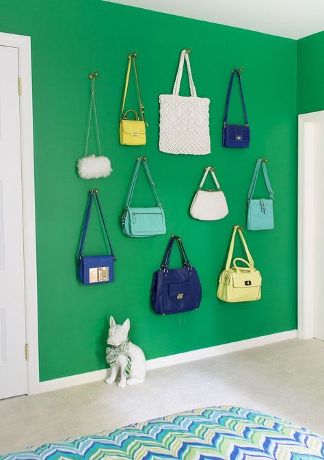 Smart storage that looks cute too - create a decorative purse wall, using the purses to store small play things that can be easily accessed when needed and hung back up on the wall at the end of playtime! Post includes lots of other ideas for decorating kids' rooms too! Purse Wall, Girls Room Organization, Organization Wall, Purse Display, Handbag Display, Driven By Decor, Wal Art, Purse Storage, Handbag Storage