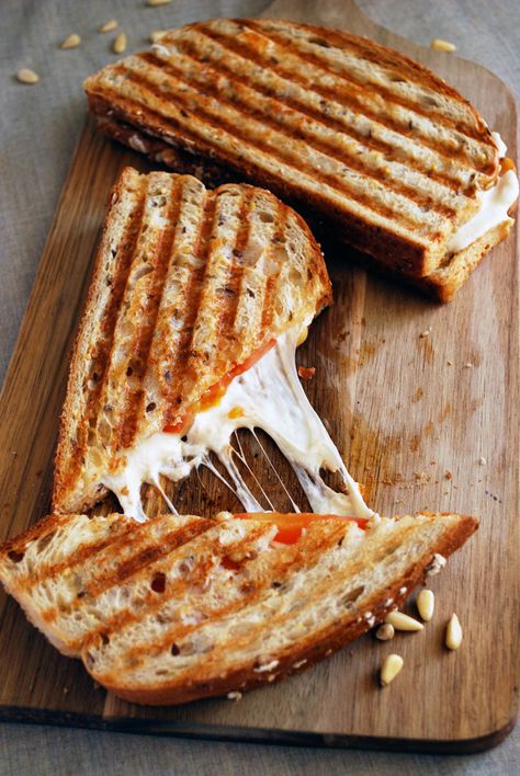 The stretchier the cheese, the better the sandwich. Get the recipe from The Live-In Kitchen. Pesto Panini, Sun Dried Tomato Pesto, Grilled Sandwiches, Panini Recipes, Panini Sandwiches, Patty Melt, Tomato Pesto, Grilled Sandwich, Peanut Butter And Jelly