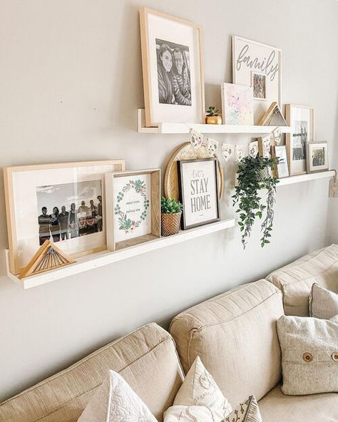 23 Stunning Ledge Ideas That Will Transform Your Living Room Single Living Room Ideas, Picture Wall Ledge Ideas, Living Room Shelf Ideas Wall Shelves, Floating Shelf Picture Display, Living Room Decor Wall Ideas, Picture Shelves Wall Photo Ledge, Lounge Ideas Living Rooms, Ikea Picture Ledge Ideas, Picture Ledge Above Couch