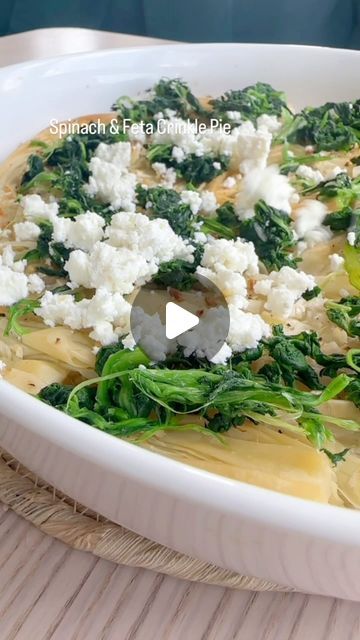 Dee | Food for everyone on Instagram: "Feta & Spinach Crinkle Pie 

1 x pack filo 
1/4 x cup Olive oil or melted butter 
3 x garlic cloves 
1 x small onion 
1 x tsp dried herbs (I used oregano) 
Pinch salt & pepper 

150g wilted spinach 
200g Feta 
100g grated melty hard cheese such as mozzarella 

Custard:
2 or 3 x eggs 
200ml cream or full fat milk 
Salt and pepper 
1 x tsp oregano 

Preheat oven to 180C

If you’re using baklava pastry like me you’ll double up the sheets if your filo is a little thicker you’ll use one sheet.

Preheat oven 180C 
Get a tart dish or round cake tin and add olive oil to the bottom.

Mix your olive oil with chopped garlic and onion and leave while you prepare the filo so they’re coated in oil and don’t burn. 

Fan fold each sheet or 2 sheets (depending on the Crinkle Pie, Spinach Filo, Filo Pie, Filo Dough, Phyllo Dough Recipes, Phyllo Recipes, Low Shelf, Phyllo Pastry, Wilted Spinach