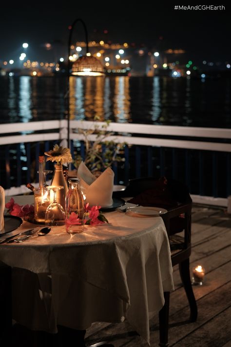 Who says you need to wait for February for a nice romantic candlelight dinner! With a setting by the pier and our chef’s curated dishes, surprise your loved one with a sumptuous meal and everlasting memories. #MeAndCGHEarth #BruntonBoatyard #FortKochi #HistoryHotel #Harbourview #Vintage #Pierdining #Romanticdinner #Pier Romantic Dinner For Two Candlelight, Romantic Candlelight Dinner, Romantic Dinner Decoration, Romantic Table Setting, Romantic Candle Light Dinner, New Years Dinner, Romantic Date Night Ideas, Candlelight Dinner, Beach Candle