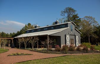 Metal Wedding Venue & Barn Building | Steel Venue Builders Equestrian Building, Post Frame Construction, Morton Building, Open Floor Plans, Gambrel Roof, Pole Barns, Metal Barn, Stone Siding, Building Projects