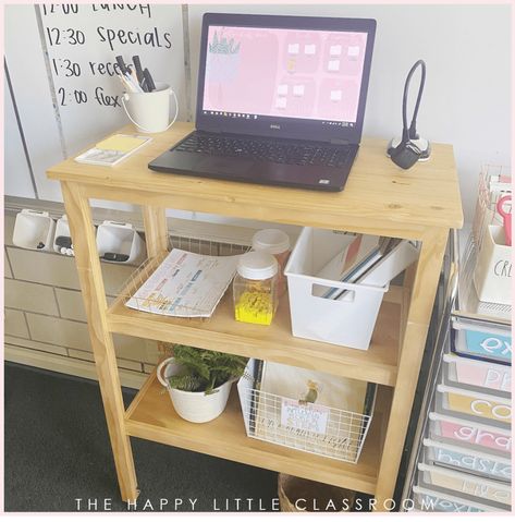 Small Group Teacher Table, 1st Grade Classroom Set Up Room Desks, Student Cubbies In Classroom, Kidney Desk Classroom, Classroom Textbook Storage Ideas, Classroom Desk Organization Teachers, Teacher Desktop Organization, Teacher Small Group Table Organization, No Desk Classroom Teachers