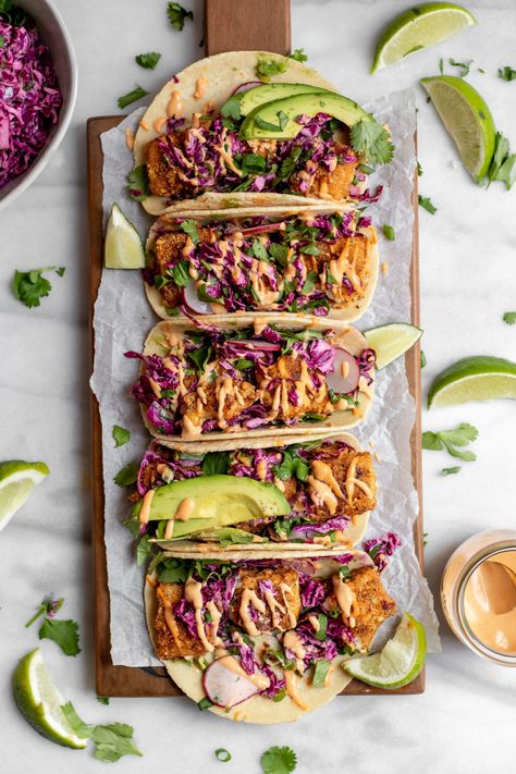 Sir Kensington's | Crispy Baked Fish Tacos with Cilantro Lime Cabbage Slaw Fish Taco Cabbage Slaw, Lime Cabbage Slaw, Mexican Pulled Pork Tacos, Fish Tacos With Cabbage Slaw, Tacos Ideas, Bacon Slaw, Tacos With Cabbage Slaw, Crispy Fish Tacos, Healthy Shrimp Tacos