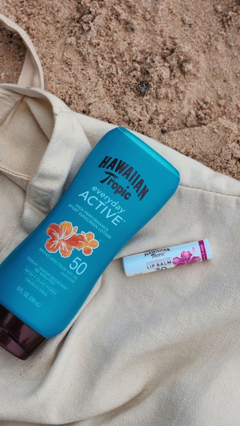 Hawaiian tropic sunscreen and lipbalm on a tote bag, on the sand at the beach Hawaiian Tropic Aesthetic, Lipbalm Aesthetic, Aesthetic Lip Balm, Hawaiian Tropic Sunscreen, Sunscreen Aesthetic, Beach Sunscreen, Safe Tanning, Beach Makeup, Lip Balm Stick