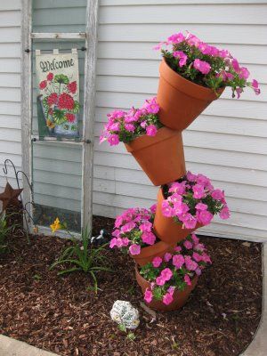 Flower pot tower Flower Pot Tower, Flower Garden Pictures, Top Flowers, Flower Tower, Potted Flowers, Small Backyard Gardens, Vertical Gardens, Diy Gardening, Wonderful Flowers