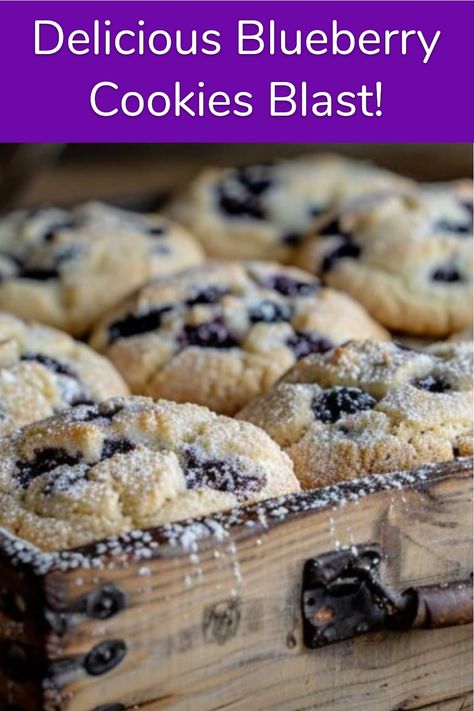 A tray of freshly baked blueberry cookies dusted with powdered sugar. Blueberry Christmas Cookies, Blueberry Cream Cookies, Taste Of Home Blueberry Cookies, Blueberry Cookies Recipes Easy, Blueberry Cake Mix Cookies, Blueberry Cookies Easy, Blueberry Cookie Recipes, Dried Blueberry Cookies, Blueberry Sugar Cookies