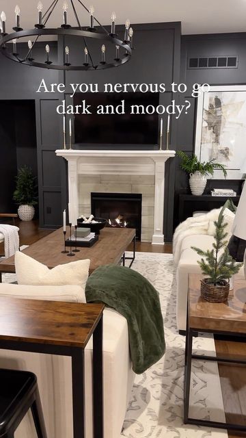 Dark Accent Wall White Fireplace, Black Fireplace Wall With Windows, Dark Color Fireplace Ideas, Black Wall Family Room, Dark Wall Light Fireplace, Black Fireplace With Black Wall, Stone Fireplace Dark Walls, Sw Iron Ore Living Room, Dark Wall With White Fireplace