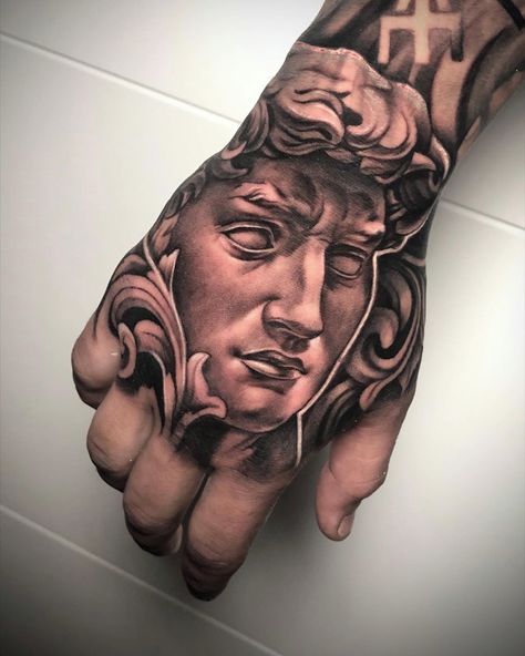 Roman Hand Tattoo, Hades Hand Tattoo, Statue Hand Tattoo, Warrior Hand Tattoo, Greek Hand Tattoo, Mens Hand Tattoos Ideas, Best Hand Tattoos Men, Angel Hand Tattoo, Hand Tattoo Design