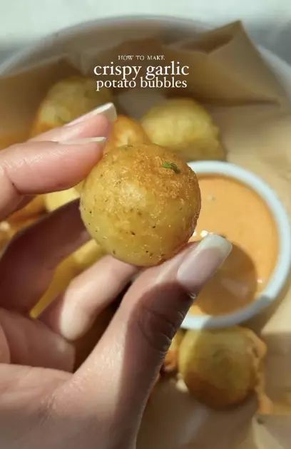 Crispy Garlic Potato Bubbles by iramsfoodstory | Quick & Easy Recipe | The Feedfeed Potato Bubbles, Carb Friendly Recipes, Bubble Recipe, Potato Balls, Mash Potatoes, Black Pepper Oil, Crispy Garlic, Stuffed Potato Balls, Pan Fry