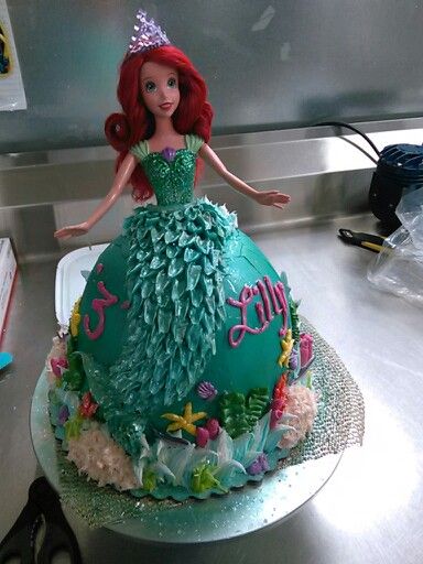 Ariel doll cake Doll Cake Buttercream, Ariel Doll Cake, Princess Doll Cake, Barbie Doll Birthday Cake, Ariel Cake, Doll Birthday Cake, Little Mermaid Cakes, Ariel Doll, Mermaid Birthday Cakes