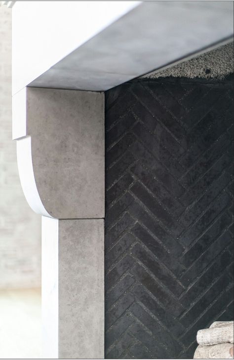 Black firebrick handlaid in a herringbone pattern inside fireplace Herringbone Fireplace, Newport Beach Homes, Living Room Fireplace, Marble House, Brick Fireplace Makeover, Fireplace Hearth, Fireplace Remodel, Diy Fireplace, Home Fireplace