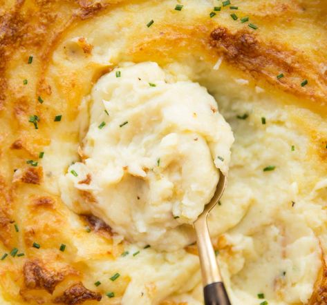 This Roasted Garlic Mashed Potato is loaded with Butter, Cream and Cheese, then baked in the oven until ultra crisp on top and gooey underneath. #cheese #roastedgarlic #potato #mashedpotatoes | www.dontgobaconmyheart.co.uk Cheesy Mashed Potatoes Recipe, Garlic Mashed Potato, Cheddar Mashed Potatoes, Garlic Mashed Potatoes Recipe, Baked Mashed Potatoes, Roasted Garlic Mashed Potatoes, Cheese Mashed Potatoes, Mashed Potatoes Recipe, Cheesy Mashed Potatoes