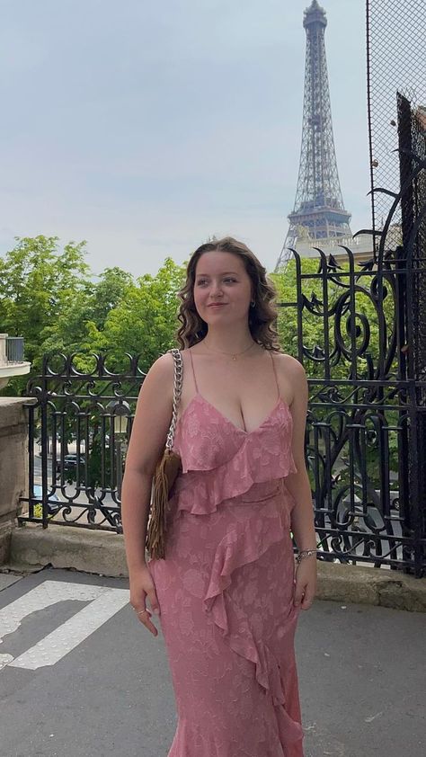 Capture the essence of Parisian elegance with this lovely pink summer dress, as seen on @micaaateixeira. Its ruffled layers and soft lace detailing are perfect for a romantic day out in the city of lights. Whether it's a casual stroll by the Seine or a chic café visit, this outfit is sure to charm. #SummerInParis #PinkDress #FashionInspiration #EiffelTowerBackdrop Romantic Essence Style, Romantic Essence, City Of Lights, Paris Summer, Pink Summer Dress, The Seine, Effortless Outfit, Aesthetic Template, Pink Summer