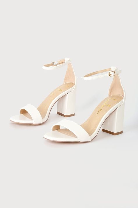 You're certain to step up your style essentials when you add the Lulus Arylee White Ankle Strap Heels to your closet! Smooth faux leather shapes a single toe strap, almond-shaped toe bed, and wrapped block heel. A dainty ankle strap rises from the sturdy heel cup and secures with a gold buckle. 3" wrapped block heel. Cushioned insole. Rubber sole has nonskid markings. Man made materials. Imported. Lulus | Arylee White Ankle Strap Heels | Size 10. Cute Honeymoon Outfits, Honeymoon Dresses, Hoco Heels, Hoco Shoes, Homecoming Heels, White Ankle Strap Heels, Graduation Heels, Homecoming Shoes, White Block Heels