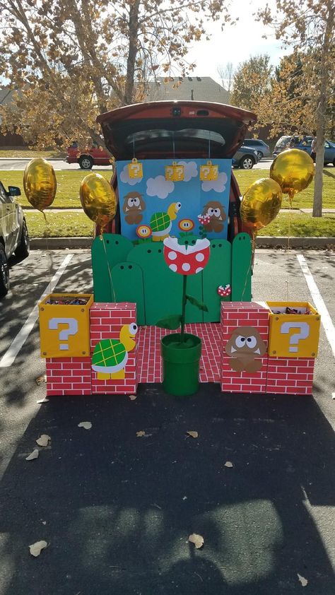 Mario Trick Or Trunk, Trunk Or Treat Super Mario Theme, Diy Mario Trunk Or Treat, Super Mario Golf Cart, Mario And Luigi Trunk Or Treat Ideas, Trunk Or Treat Booth Ideas, Super Mario Float, Nintendo Trunk Or Treat, Trunk Or Treat Ideas Mario