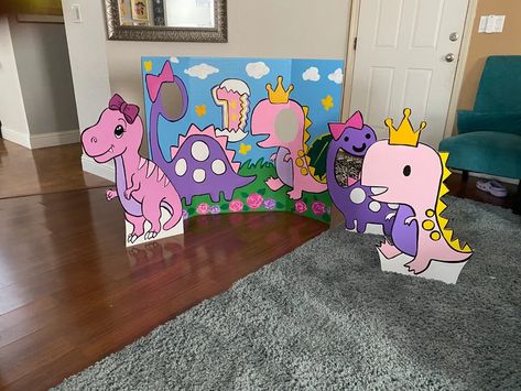 Pink Dinosaur Party Table, Dinosaur Face In Hole, Pink Dinosaur Decorations, Pink Dinosaur Birthday Party Decorations, Dinosaurs And Unicorns Party Decorations, Girl Dinasour Birthday Party Ideas, Pink Dinosaur Party Food, Triceratops Birthday Party, Dinosaur Birthday Party For A Girl