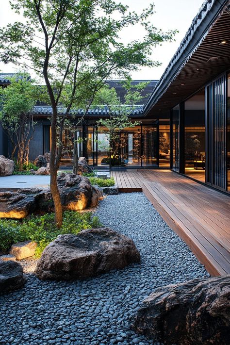 Chinese inner courtyard with garden walls wooden deck rocks chinese detailing modern office building visible over the roof from the courtyard. These Chinese courtyard houses revive ancient charm and bring tranquility into modern living. House Inner Courtyard, Courtyard House With Pool, Chinese Courtyard Garden, Courtyard In Middle Of House, Modern House Courtyard, Inner Courtyard House, Modern Courtyard Design, Japanese Courtyard House, Chinese Garden Design