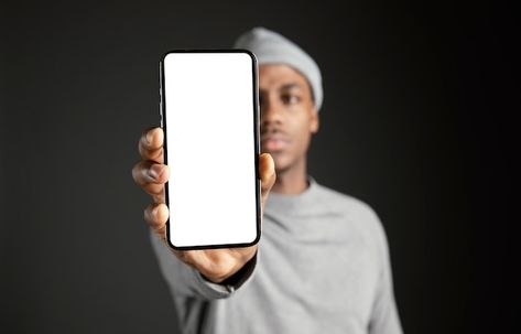 Male wearing cap holding phone Free Phot... | Free Photo #Freepik #freephoto #man-with-mobile #man-with-phone #mobile #technology-phone Man Holding Phone, Black Panther Hd Wallpaper, Business Portraits Woman, Holding Phone, People Images, Concert Flyer, Jay Jay, Smiling Man, Logo Wall