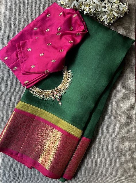 Mishrita dark green organza silk saree -  Mishrita sarees are a signature fusion range from the house of Aavaranaa. As a means of upcycling and sustainability , we have made these unique saree a sense of pride for ourselves. The saree has a pure organza silk body with pure zari kanchi silk borders and pallus. The saree also comes with a contrast blouse piece like the pallu colour. Saree being light and easy to drape is a great and funky alternative to the otherwise traditional kanchipurams itself. To view our mishrita sarees, pls click on https://aavaranaa.com/product-tag/mishrita/ Dark Green Saree Contrast Blouse, Dark Green Saree, Unique Saree, Pearl Blouse, Saree Styling, Blouse Designs High Neck, Organza Silk Saree, Indian Saree Blouse, Half Saree Designs