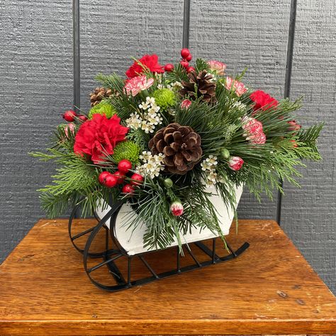 The Countdown to Christmas is on! 🎄🎁 . We're making your holiday season magical with 25 days of Christmas arrangements and gifts! Starting today we'll unveil a stunning new arrangement or holiday gift each day, perfect for spreading cheer to your loved ones or treating yourself. . Today is our "Oh What Fun" sleigh arrangement! https://fussellflorist.net/oh-what-fun.html . Follow along as we count down to the big day with unique creations you won't want to miss! Christmas Sleigh Floral Arrangement, Christmas Sleigh Centerpiece, Sleigh Centerpiece, Holiday Flower Arrangements, Christmas Floral Arrangements, 25 Days Of Christmas, Holiday Flower, Christmas Sleigh, Countdown To Christmas