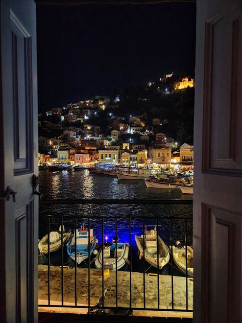 View from my window | Night view from my window in the apartment I stayed in when I was on holiday on the beautiful Greek Island of Symi | Facebook Greece View From Window, Greece Winter, Italy At Night, Symi Greece, Winter Study, View From My Window, Dodecanese Islands, Harbor Town, Island Life Style