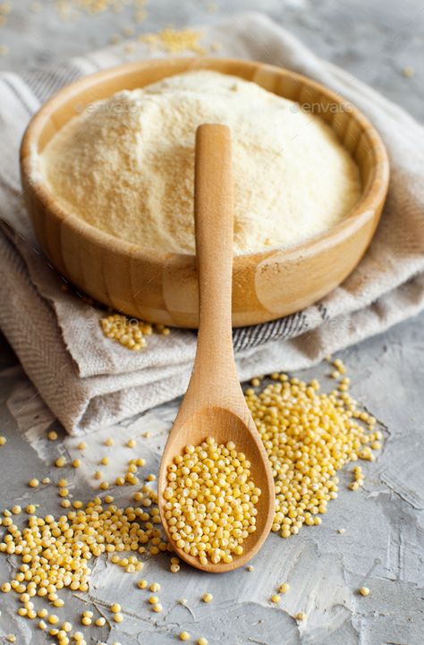 Hulled millet flour and grain in a bowl by katrinshine. Hulled millet flour and grain in a bowl close up #AD #flour, #millet, #Hulled, #grain Millet Photography, Quotes On Millets, Millets Poster, What Is Millet, Pearl Millet, Millet Flour, Millet, African Food, Coffee Art