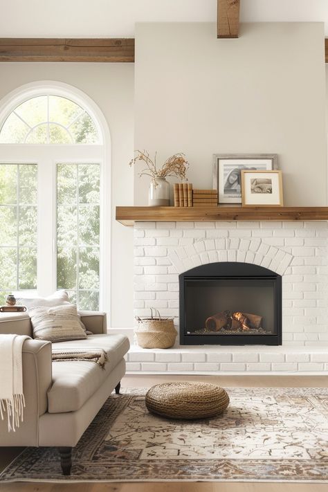 15 Captivating White Brick Fireplace Ideas to Transform Your Home – Everyday Inspo White Brick Fireplace Green Walls, White Fireplace Brick With Wood Mantel, White Brick Gas Fireplace, Fireplace Remodel Brick, Remodeled Fireplace Before And After, Beige Fireplace Brick, Living Rooms With Brick Fireplace, Cottage Style Fireplace Ideas, Fireplace Ideas White Brick