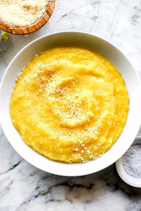 The easiest way to cook creamy, soft polenta won’t take hours of whisking or tending when it’s cooked in the oven instead of on the stovetop. Too often I’ve been served polenta that tastes chalky or gritty or just doesn’t have much flavor. Polenta is a very simple dish, but in most recipes, it typically... continue reading... about Creamy Polenta The post Creamy Polenta appeared first on foodiecrush. Italian Chicken Dishes, Cheesy Polenta, How To Cook Polenta, Foil Packet Dinners, Polenta Recipes, Creamy Polenta, Foodie Crush, Best Comfort Food, Easy Cheesy